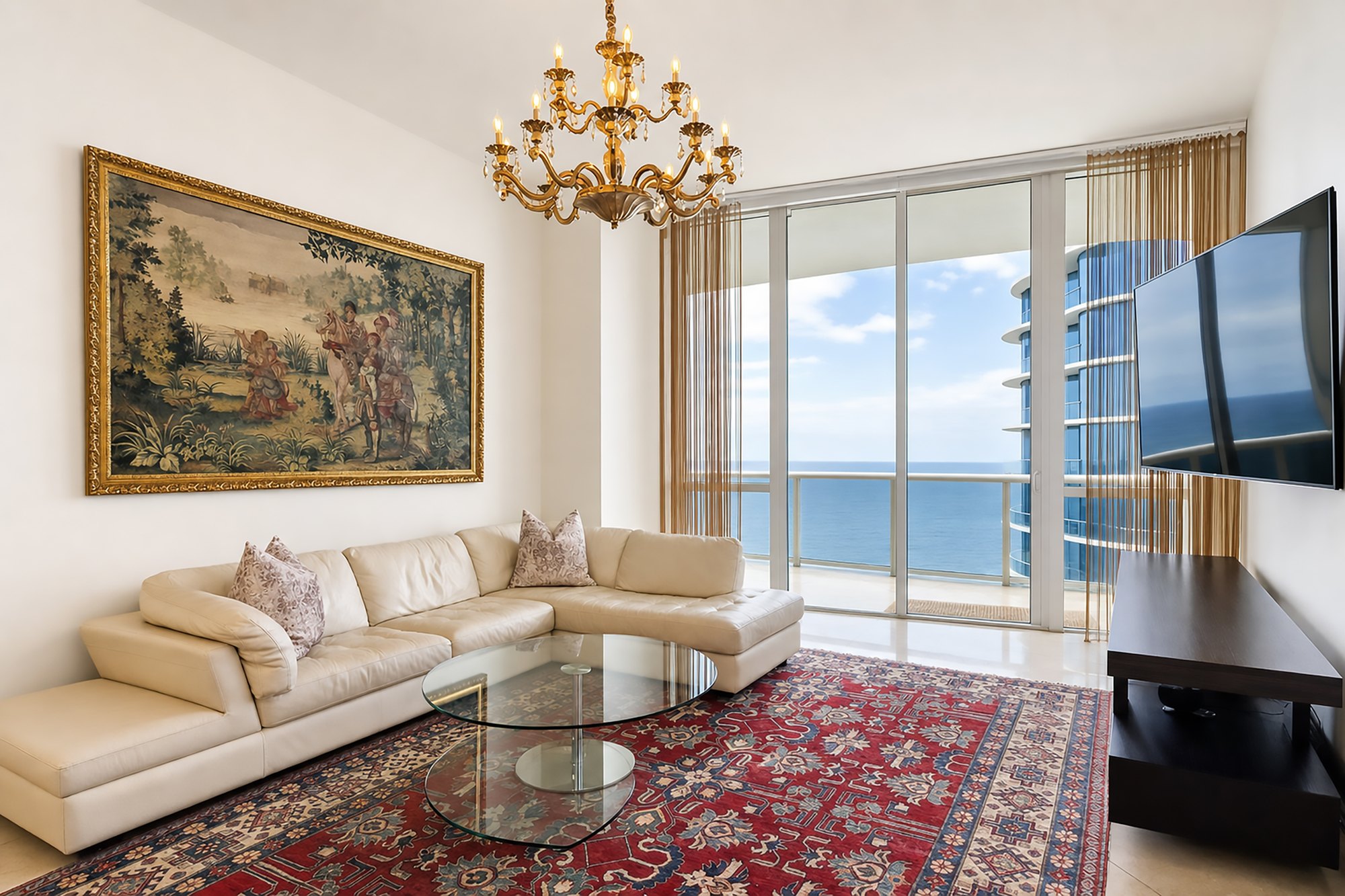 Furnished living room at Residence 4007 with direct ocean views
